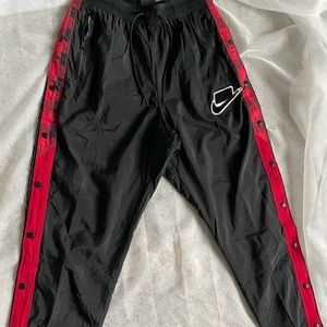Nike Tear Away Black/Red/Plaid Pant.